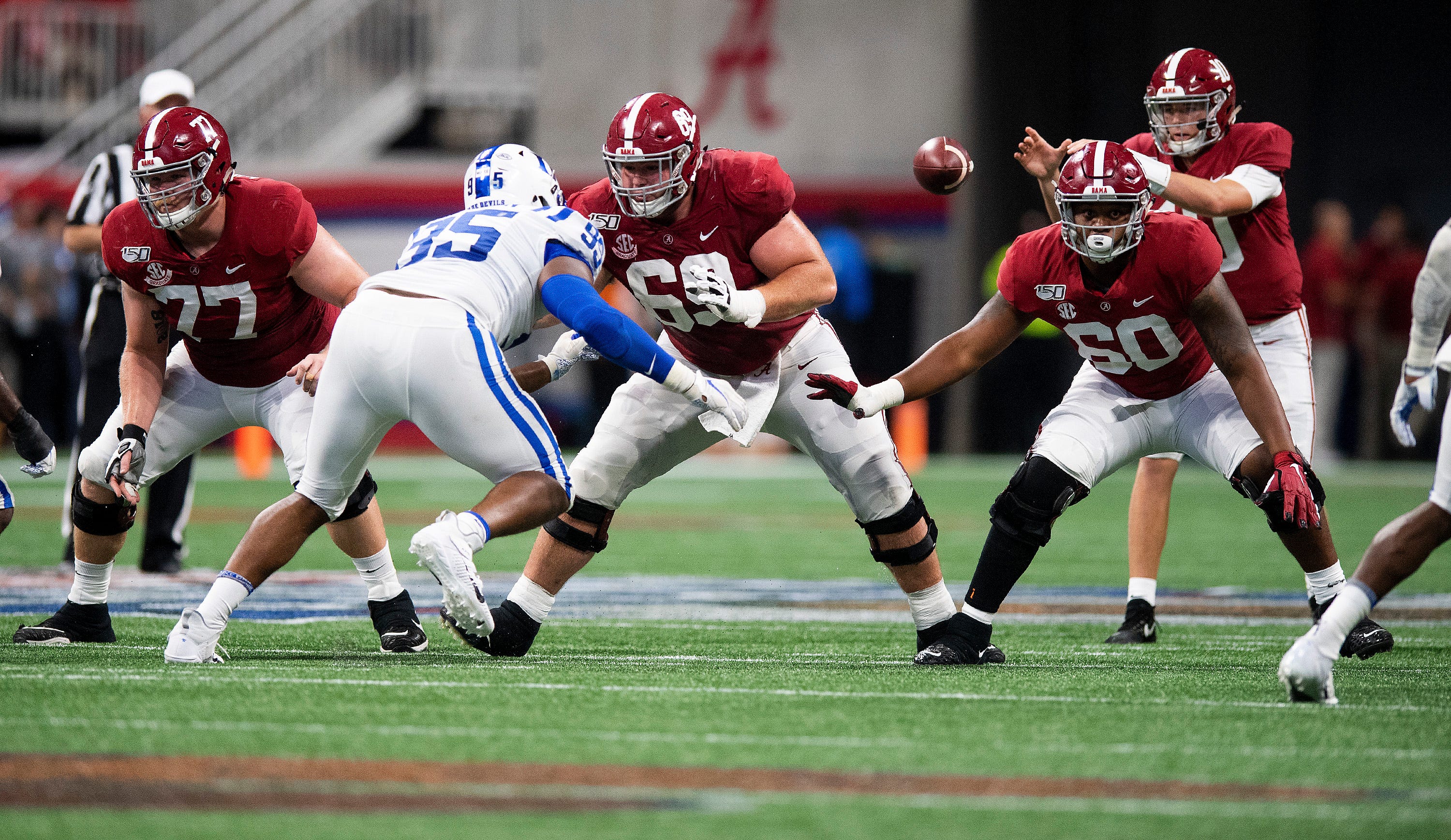 Alabama offensive linemen Matt Womack (77), Landon Dickerson (69) and Kendall Randolph (60) against Duke in the Chick-fil-A Kickoff Game at Mercedes Benz Stadium in Atlanta, Ga., on Saturday August 31, 2019.