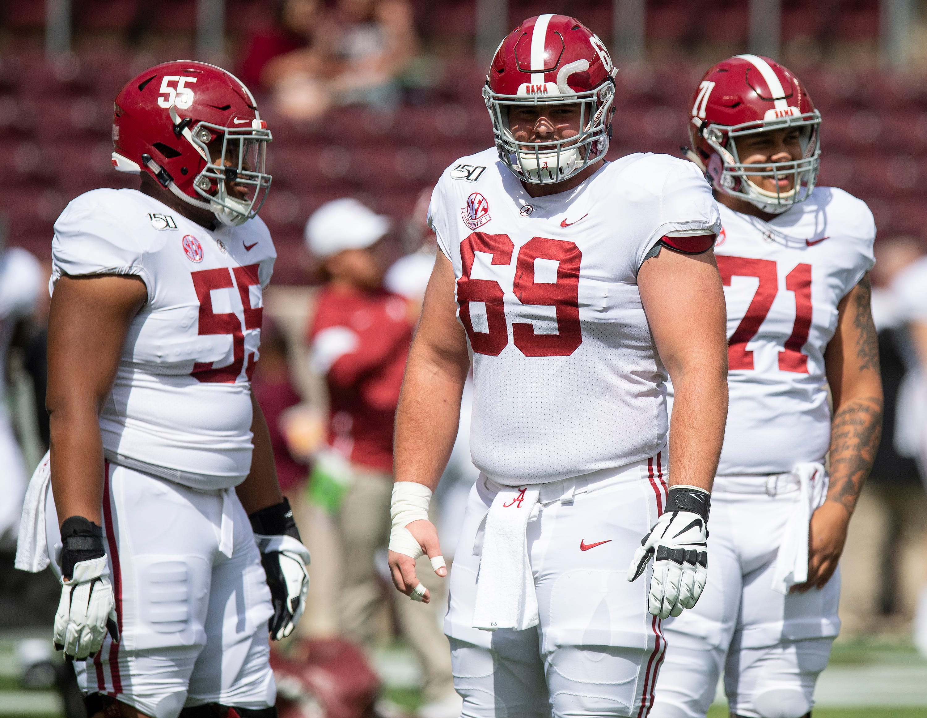 Alabama offensive linemen Emil Ekiyor, Jr., (55), Landon Dickerson (69) and Darrian Dalcourt (71) before the Texas A&M game at Kyle Field in College Station, Texas on Saturday October 12, 2019.